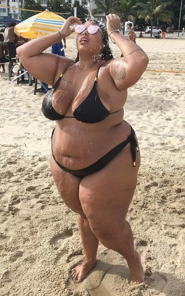 Confident Bikini Babe Cooling Down On The Beach Nudes Bbwbikinis