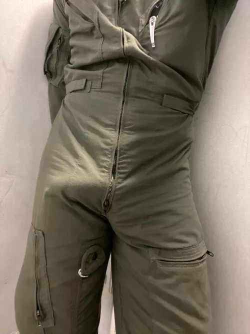 24 Help [M]e get my flight suit off?