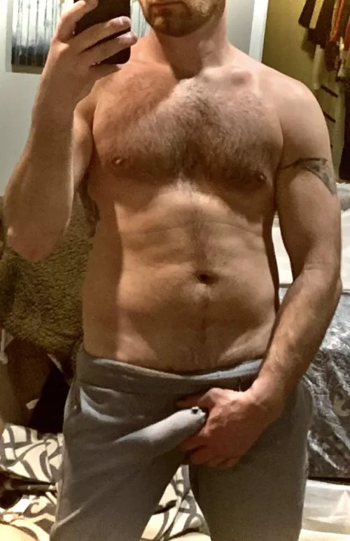 38 year old cock stretching out my grey sweats!