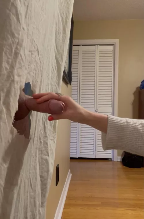 A little afternoon fun milking this sexy cock at our home gloryhole.