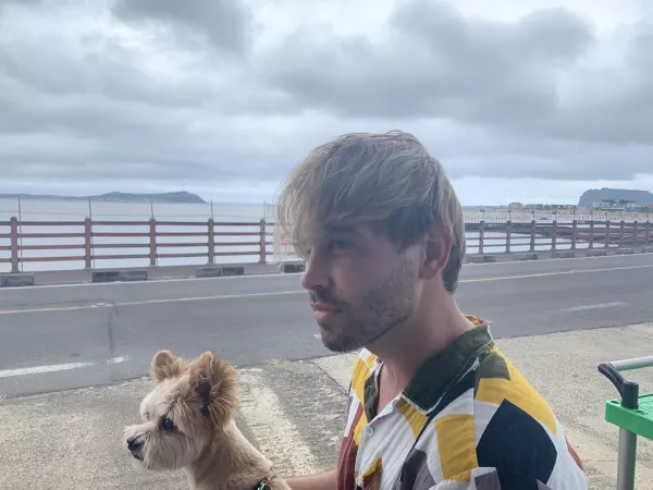 A photo my boyfriend took of me and a friend's pooch. A photo my boyfriend took of me and a friend's pooch.