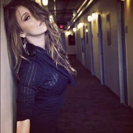 Against the wall