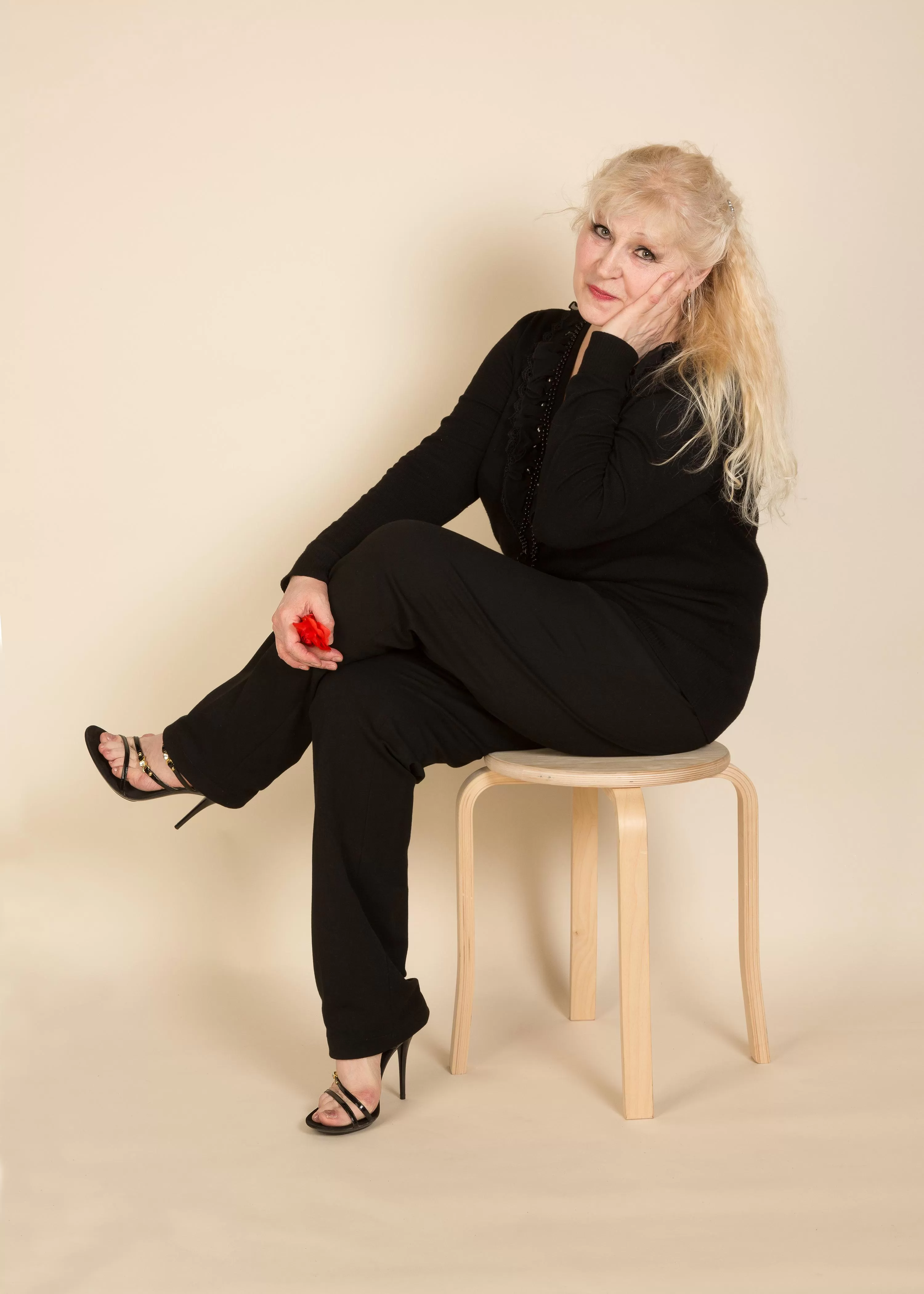 Aged blonde in black Aged blonde in black