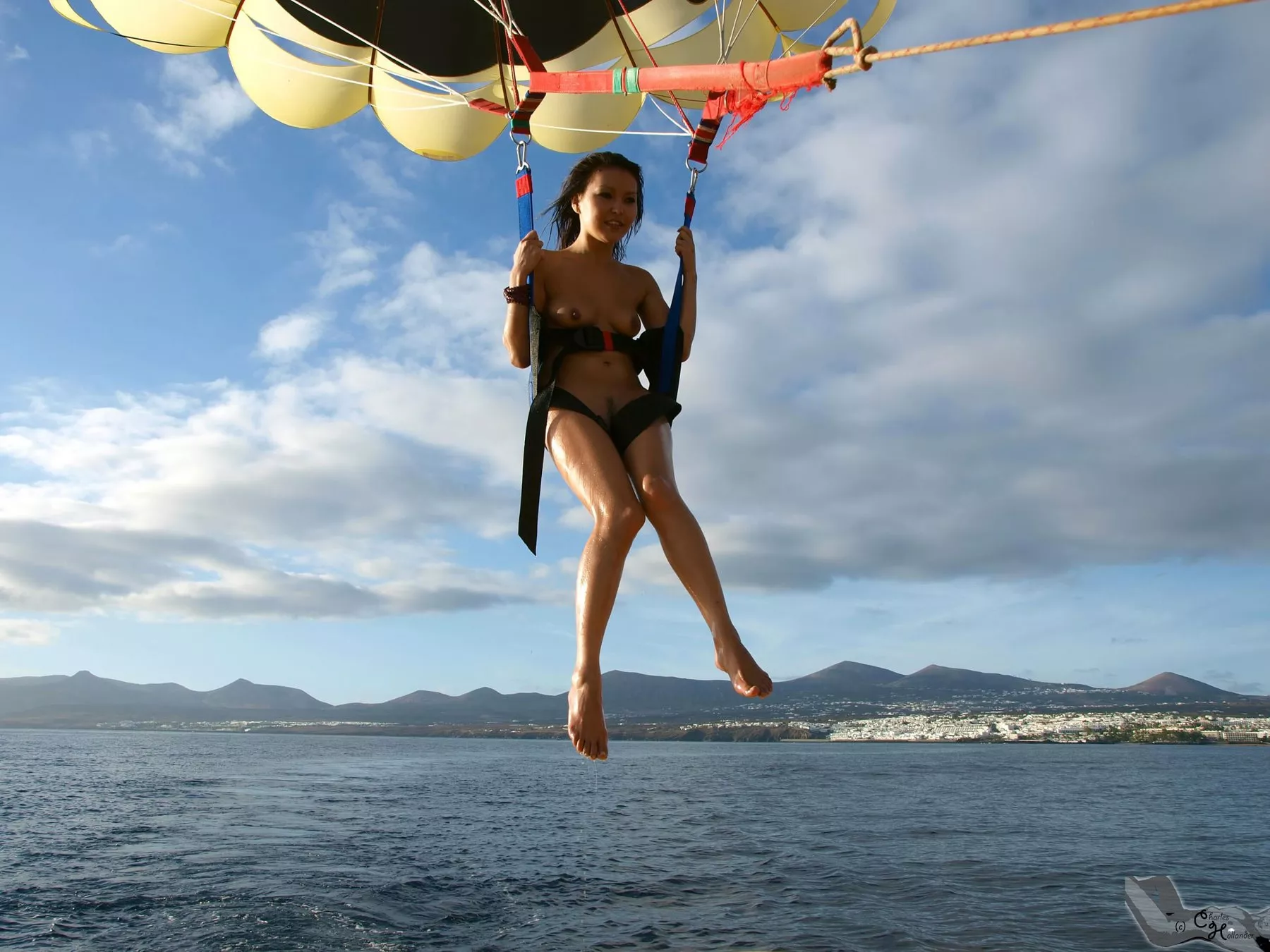 Agi naked while parasailing Agi naked while parasailing