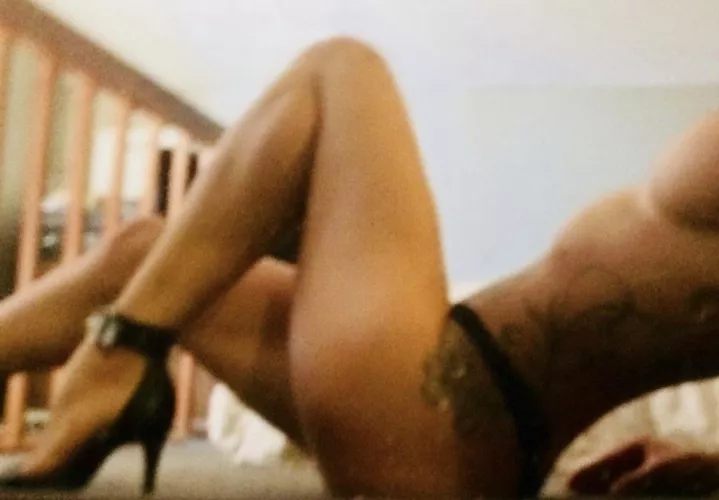 All a girl needs is a thong & some heels!