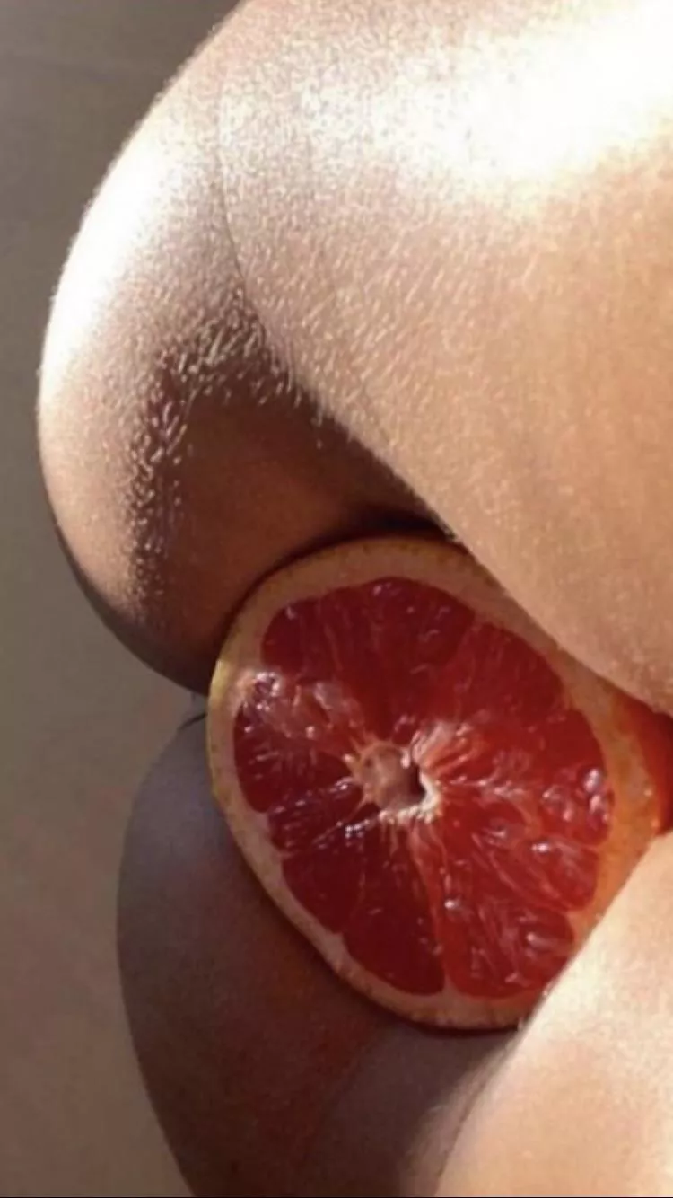 An orange and a peach An orange and a peach