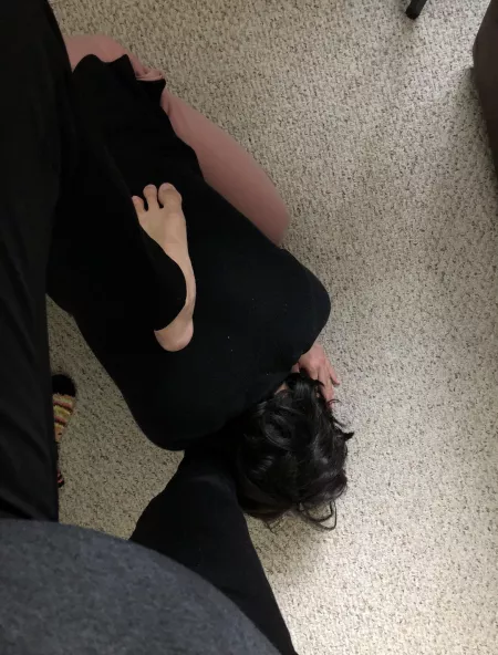 At her feet At her feet