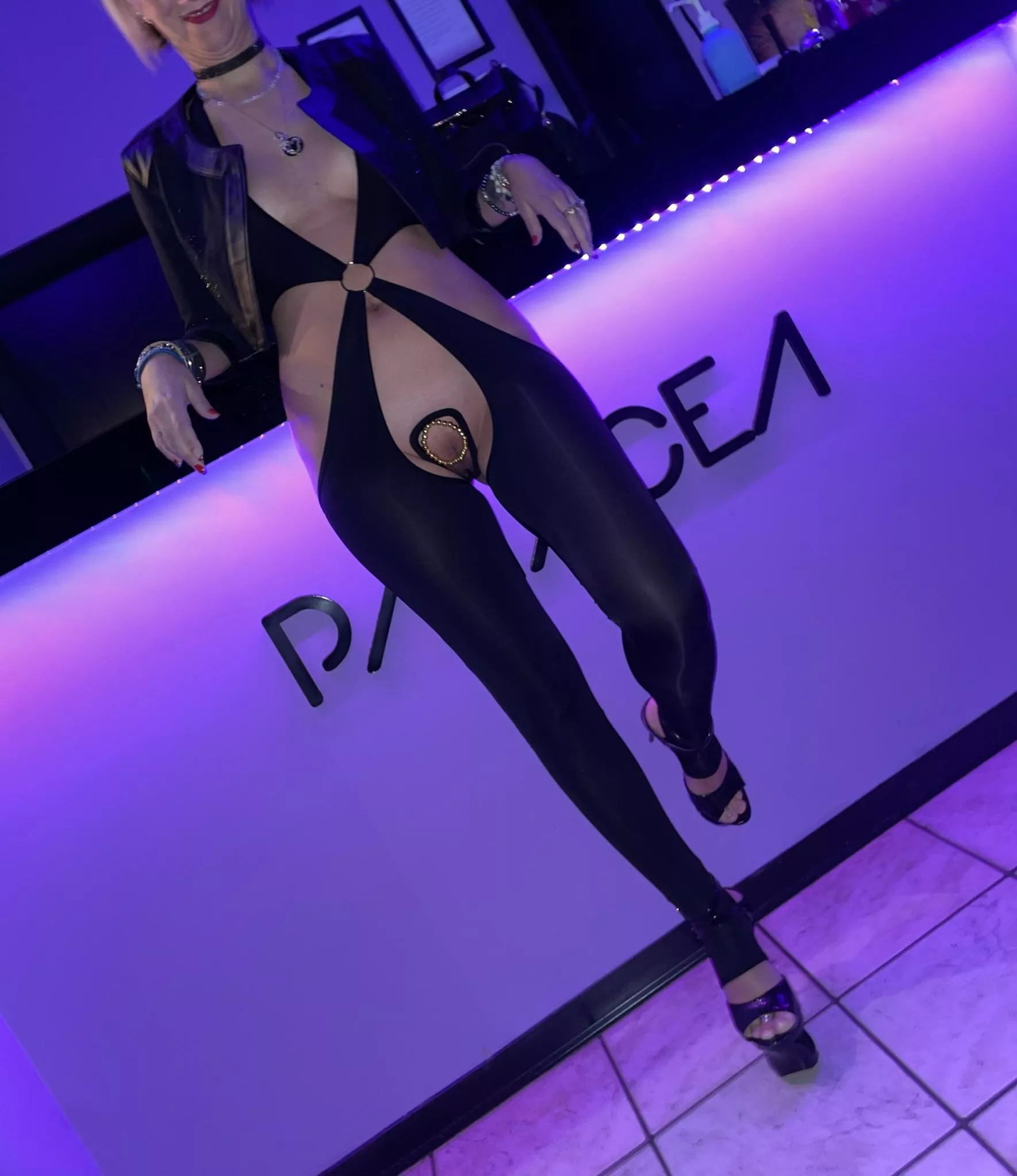 at the counter waiting to enter the premises