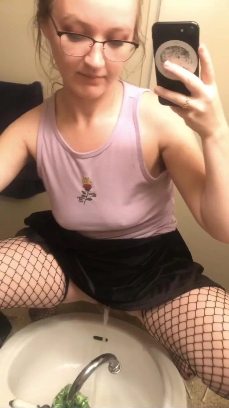 Being naughty and peeing in my sink hehe