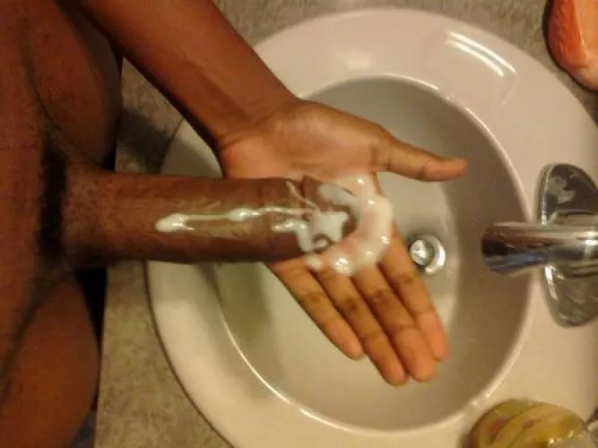 Black cock explodes big thick load into its owners palm. Yummy!
