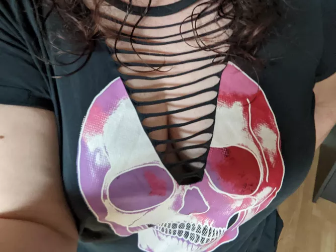 Braless in a cutaway tee