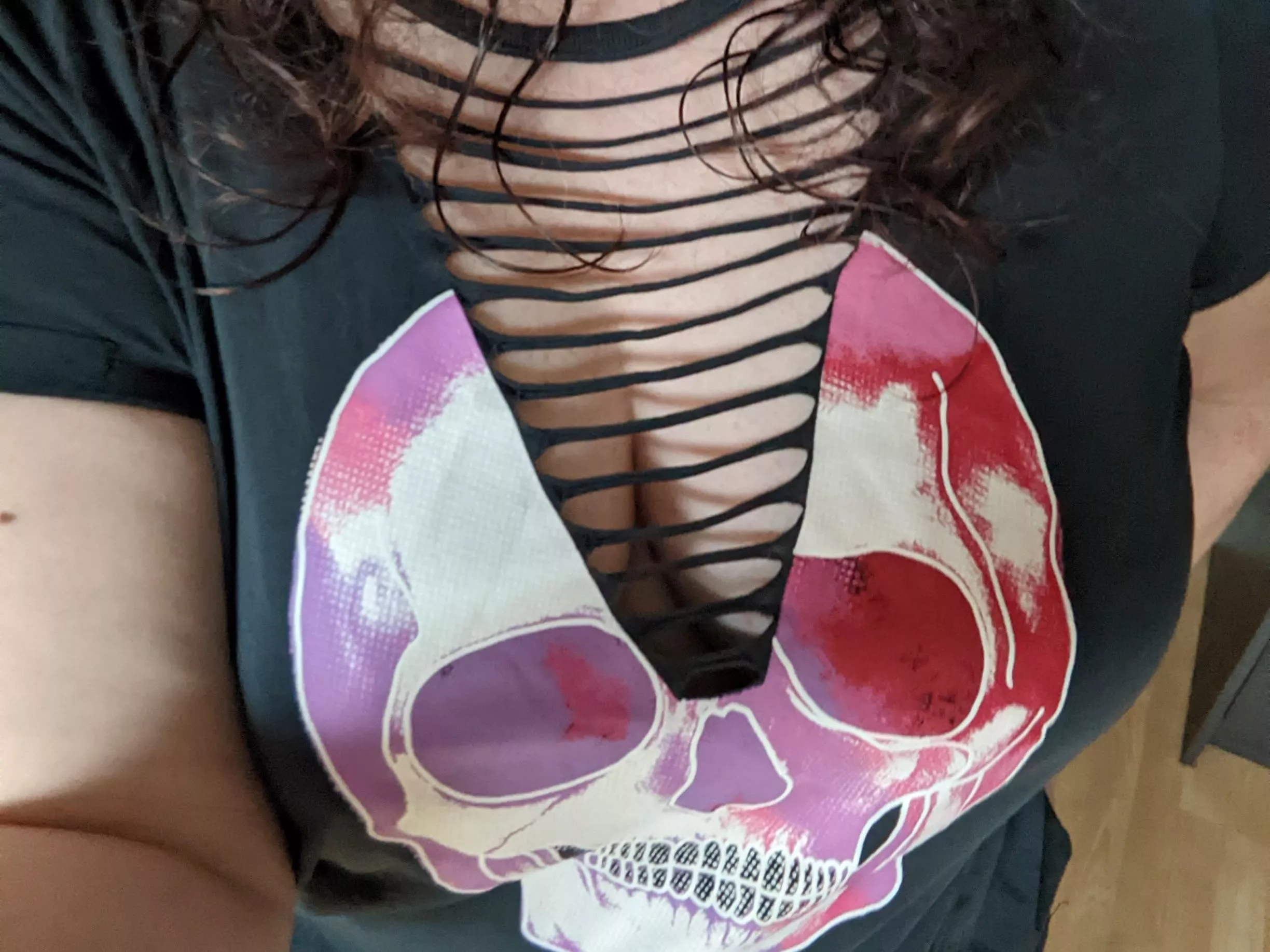 Braless in a cutaway tee