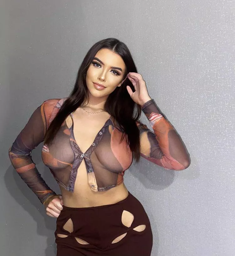 Busty in a see thru top Busty in a see thru top