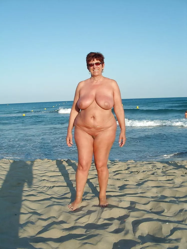 Chubby tan mature nudist posing on the beach nudes | Watch-porn.net
