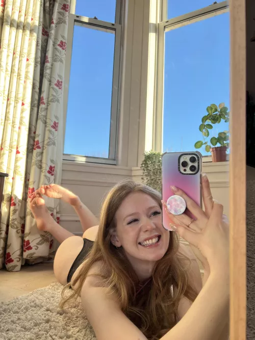 Come and play with my feet while I lie in the sun!