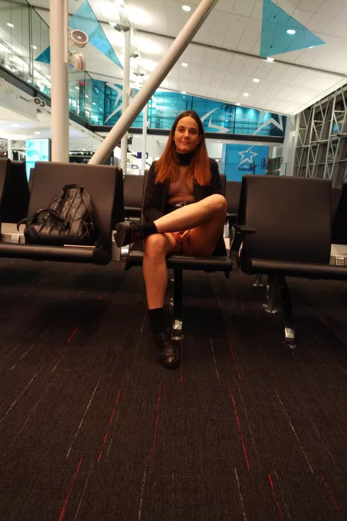 Crossing my legs to give the passengers a better view of my pantiless cunt. Turned me on sooo much seeing their eyes looking in between my legs .