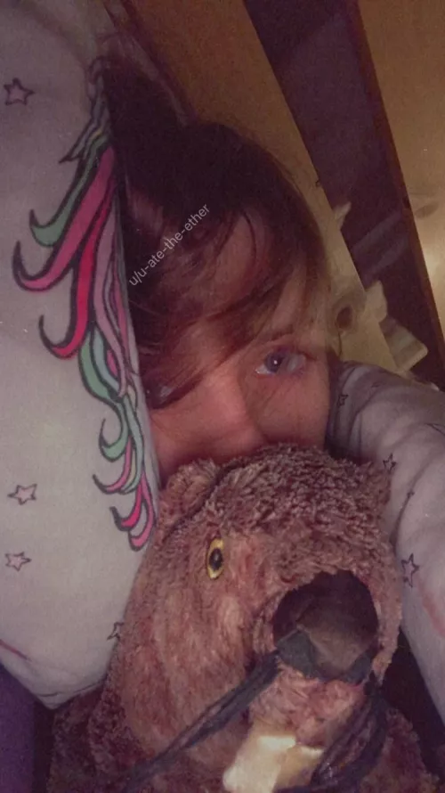 Cuddling my oldest plushy bc i feel awful and sad