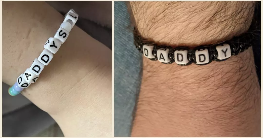 Daddy and baby girls new bracelets bought for each other for Christmas.