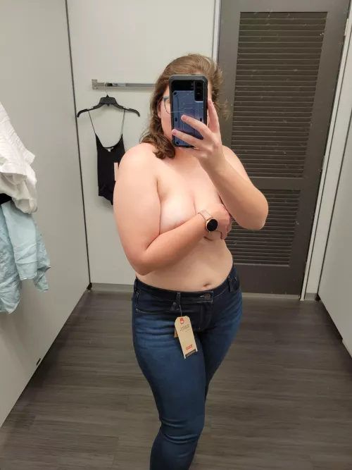 Dirty mirror, tag hanging... seems like a good dressing room picture