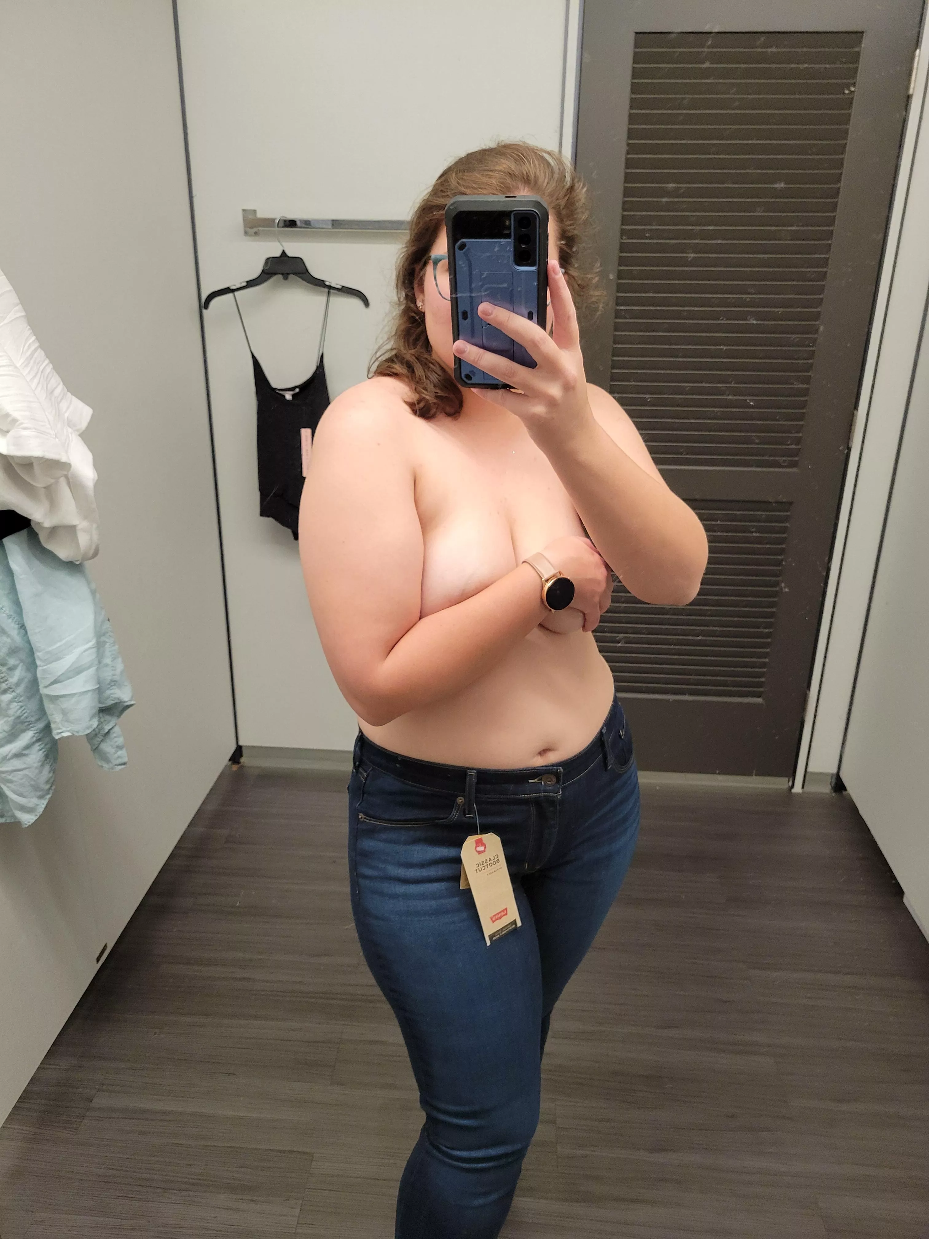 Dirty mirror, tag hanging... seems like a good dressing room picture