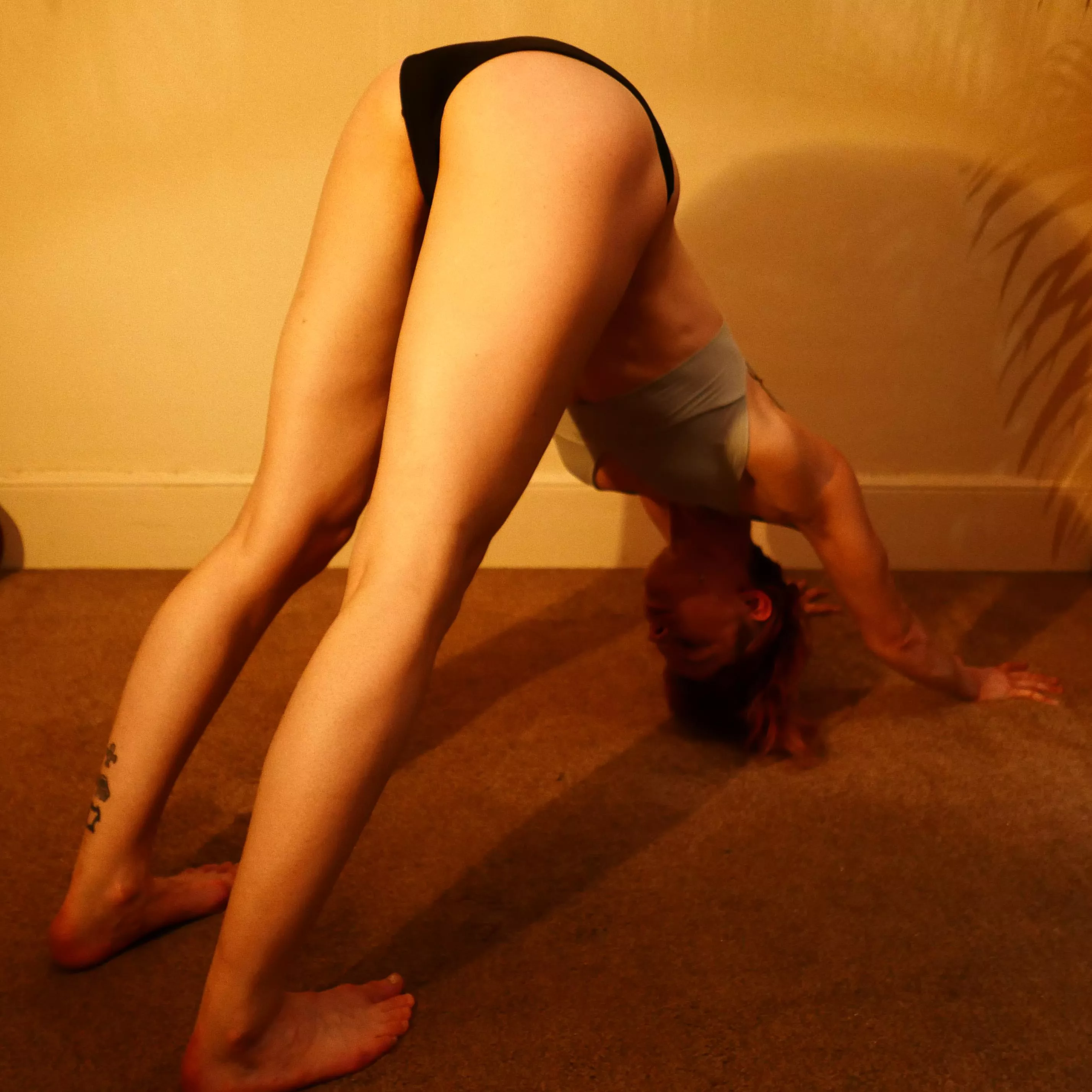 Downward dog in bikini so you can see more leg Downward dog in bikini so you can see more leg
