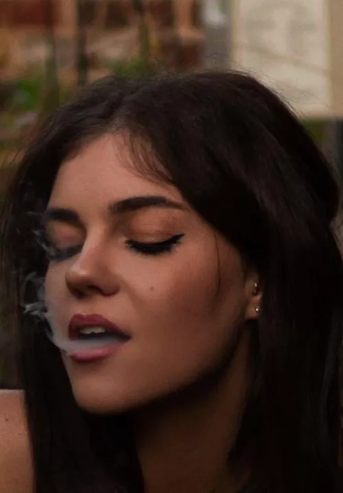 Enjoying a cigarette before going out