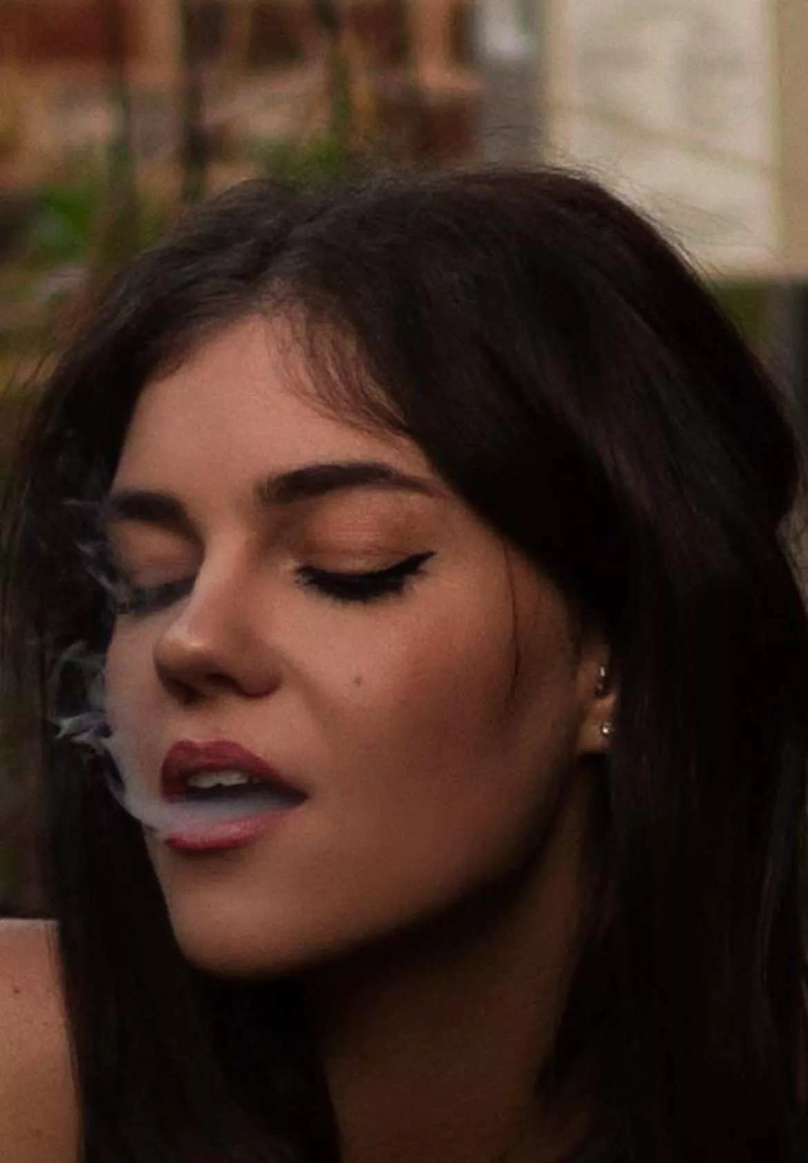 Enjoying a cigarette before going out