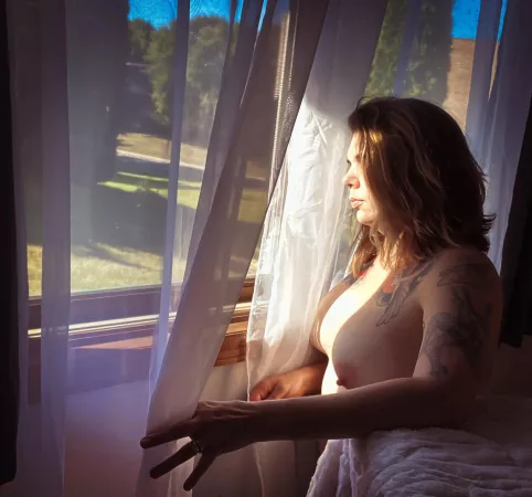Enjoying the light from my bedroom window Enjoying the light from my bedroom window