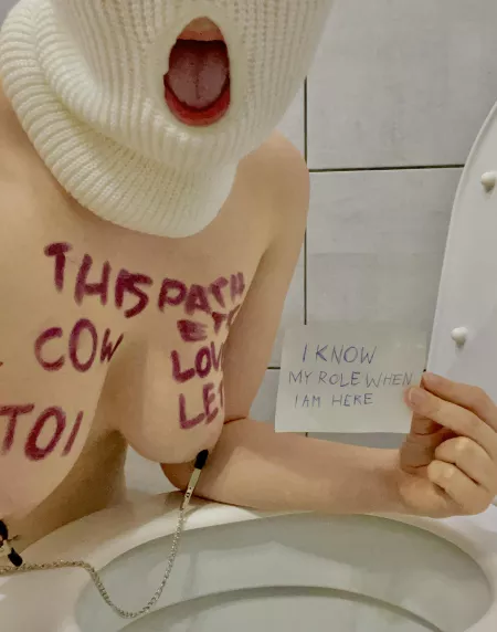 Even if she’s wearing the balaclava my slave is still a worthless whore.