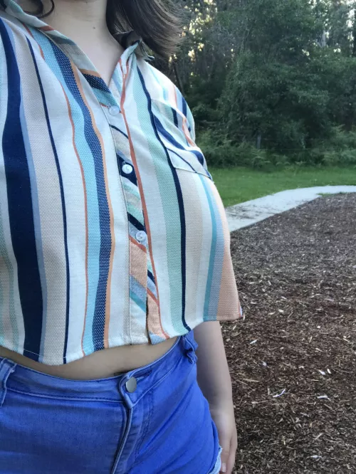 Evening braless walk on the beach