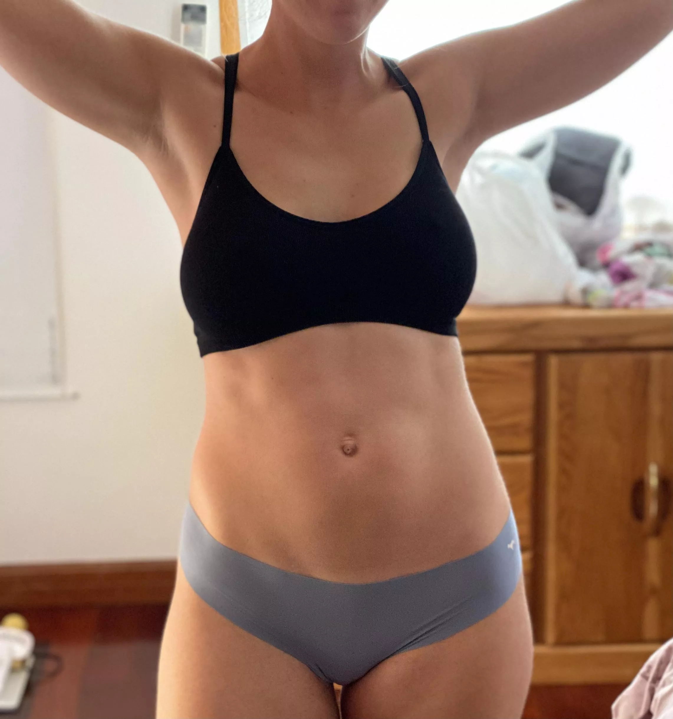 Flexing in a simple suit for the beach!