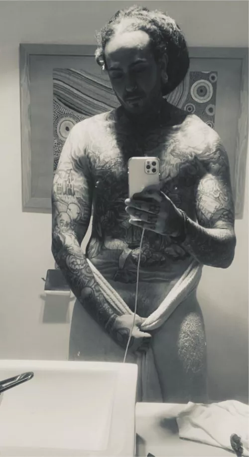 Fresh out the shower playing with black and white