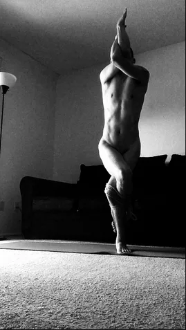 Gardasana pose with a double column leg tie Gardasana pose with a double column leg tie