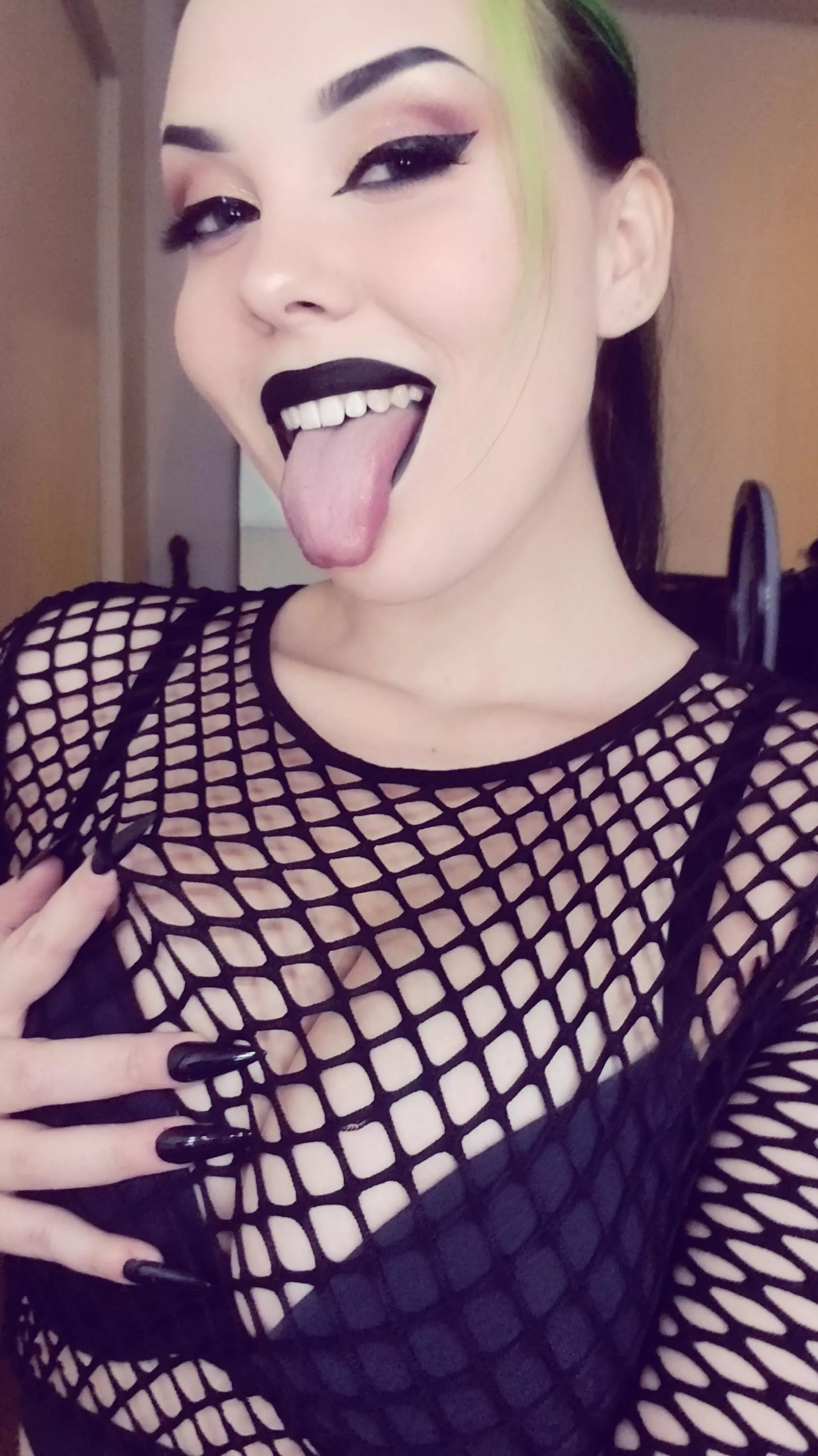 Get your tongue wrapped up in this fishnet top. 😈
