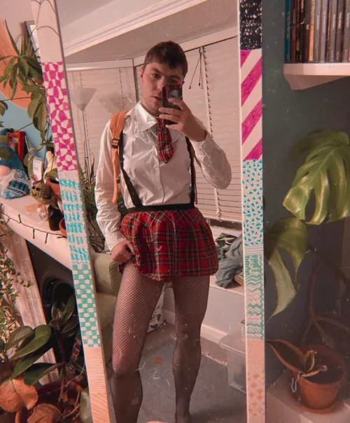 Getting ready for my first day of queer gamer school 🥺 what do we all think of my uniform? 📚🏳️‍🌈