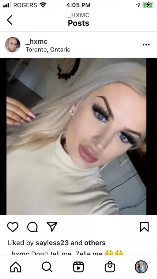 Gleaming blue eyed blonde with plumped lips