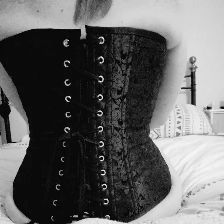 Had a sexy boudoir shoot in my black corset and fishnets today 🥰