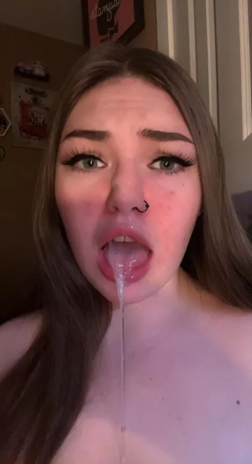 Half in my mouth, half on my face