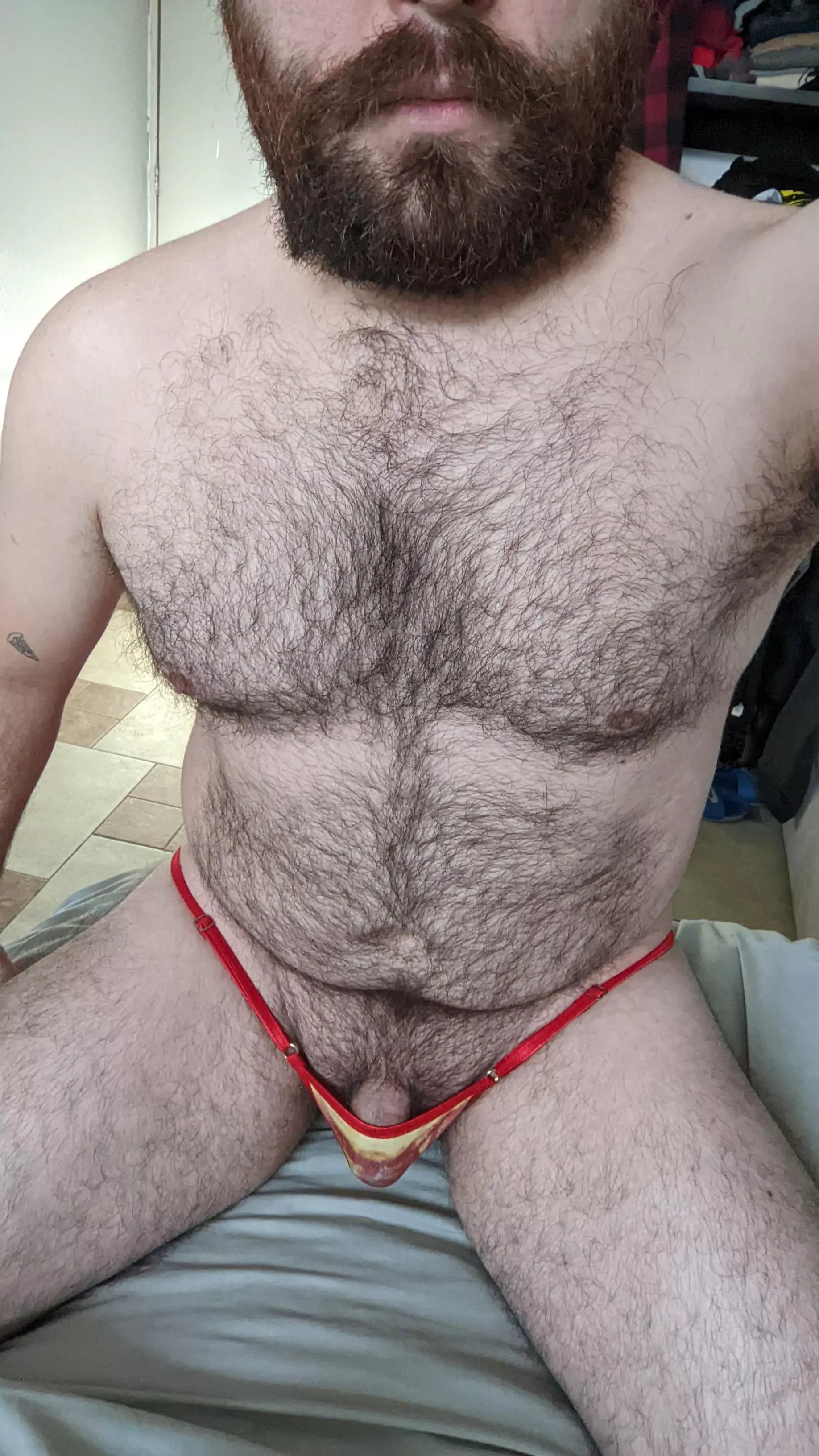 Hard hairy daddy held by a teeny tiny thong