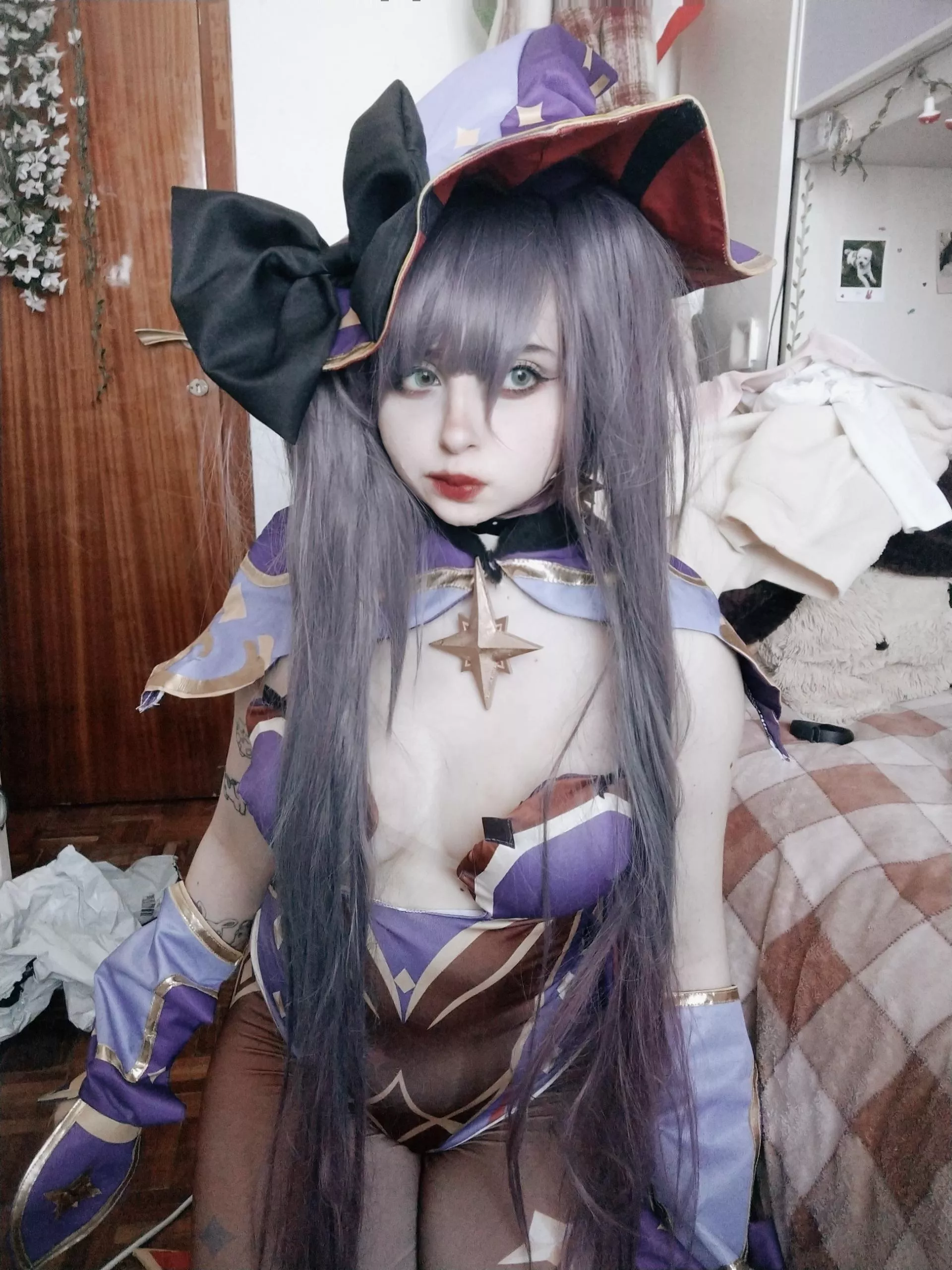 hi here's my mona cosplay from genshin impact, ig @w.afflee