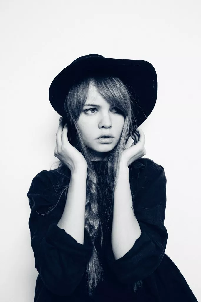 Holding on to her hat Holding on to her hat