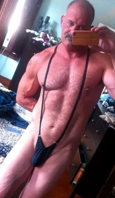 Hot daddy in a slingkini Hot daddy in a slingkini
