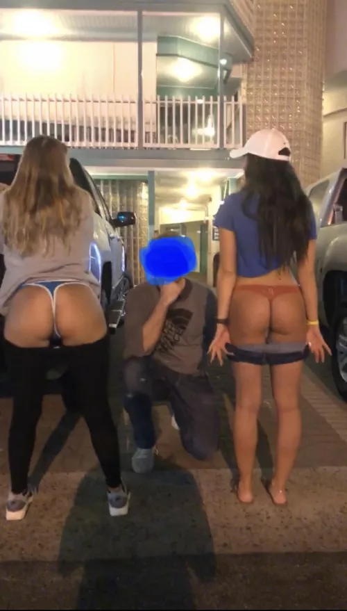 Hotwife & Friend posing with strangers outside of the bar