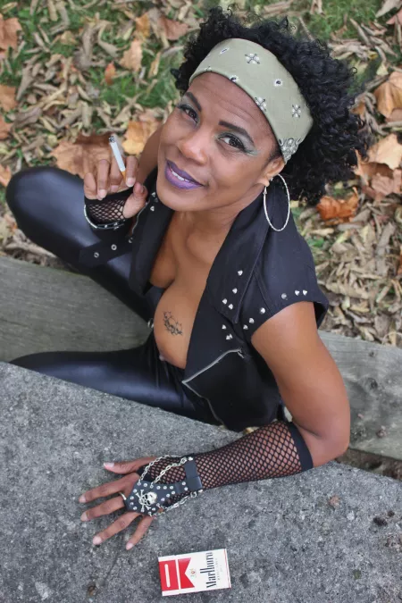 I don't have to finish my cigarette to suck your cock. I can do both at the same time.