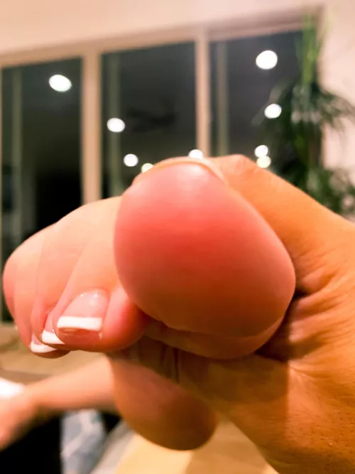 I love teasing him with my soft toes. π