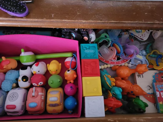 I tried putting away my toys and pacifiers neatly for once😄