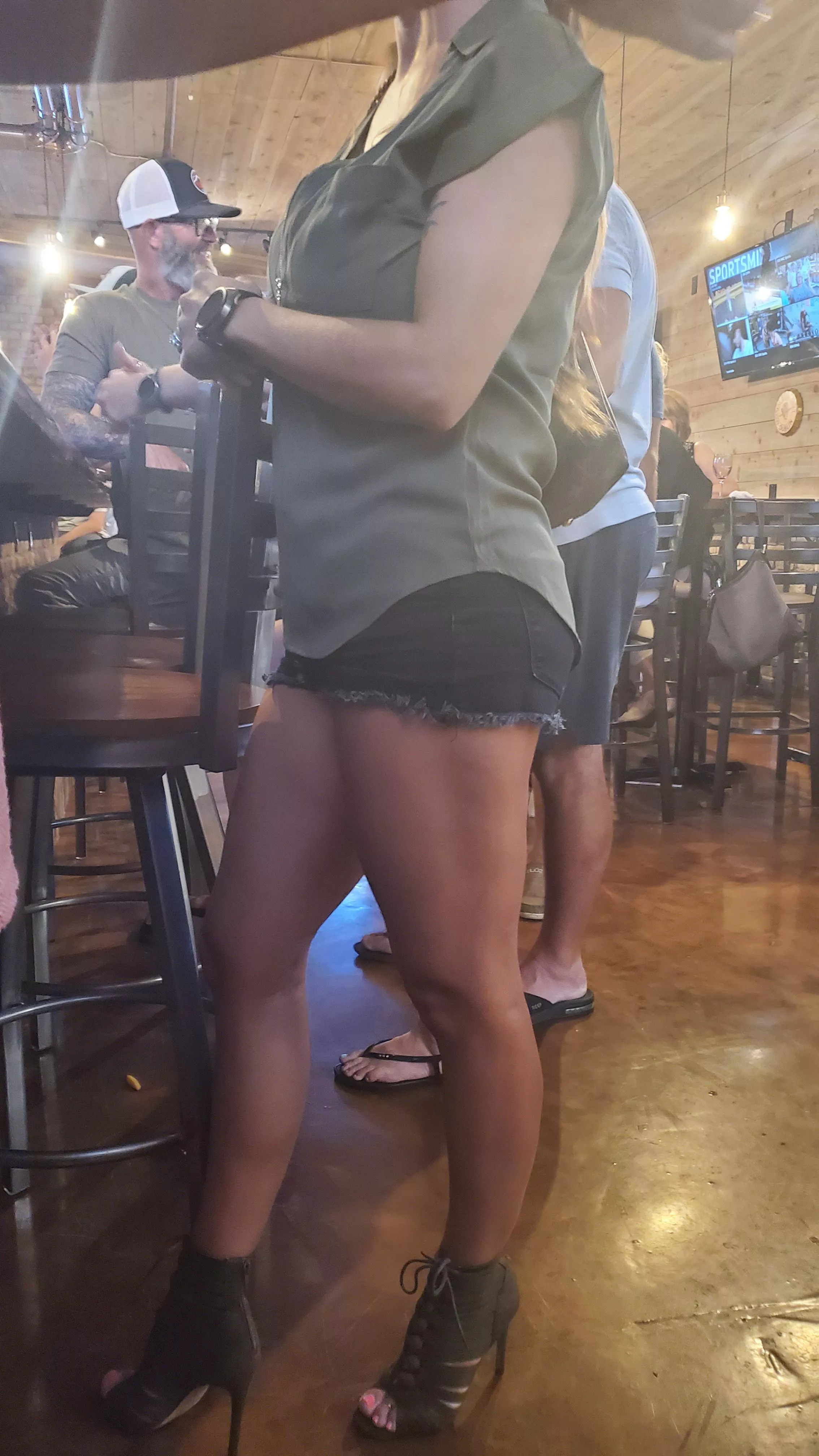 I wear short shorts and heels because I know how much my husband loves it. The fact that he took a picture of me while I was ordering a drink is proof that he does. I wear short shorts and heels because I know how much my husband loves it. The fact that he took a picture of me while I was ordering a drink is proof that he does.