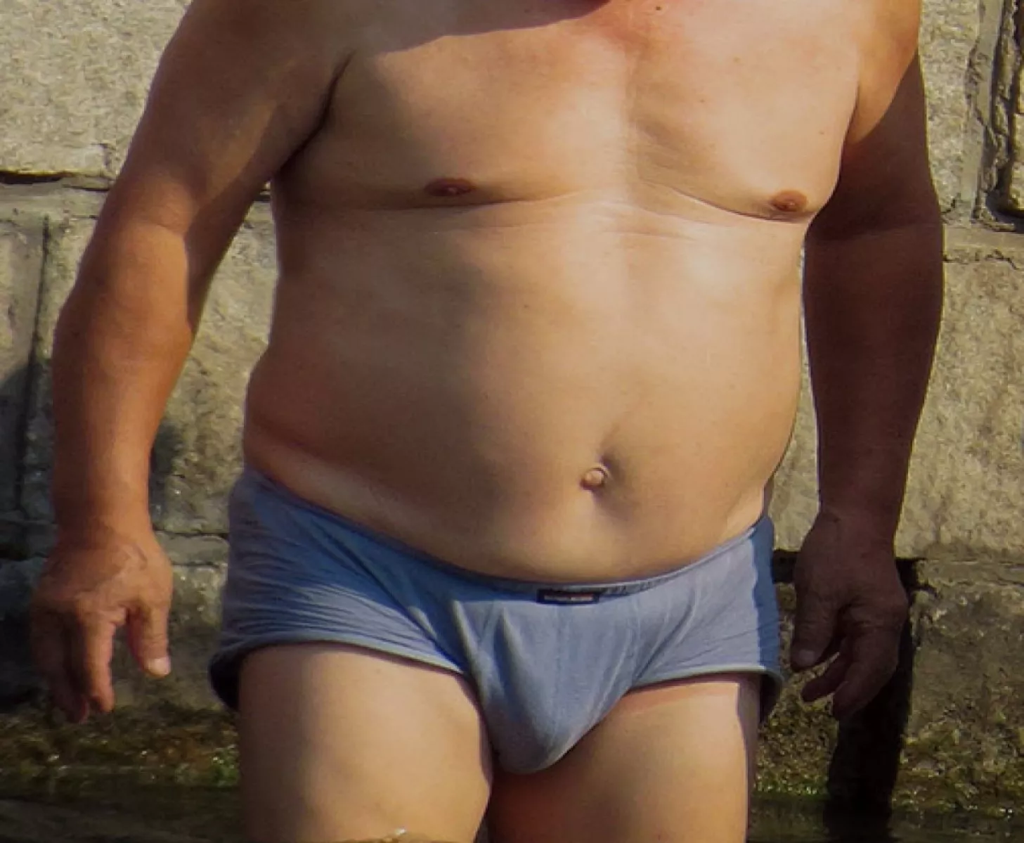 I'm just a Big-Bellied man. I took this photo of me last summer in my town of Oakhurst California. What do you think of my blue trunks? I hope some chaser men in Fresno are seeing this.