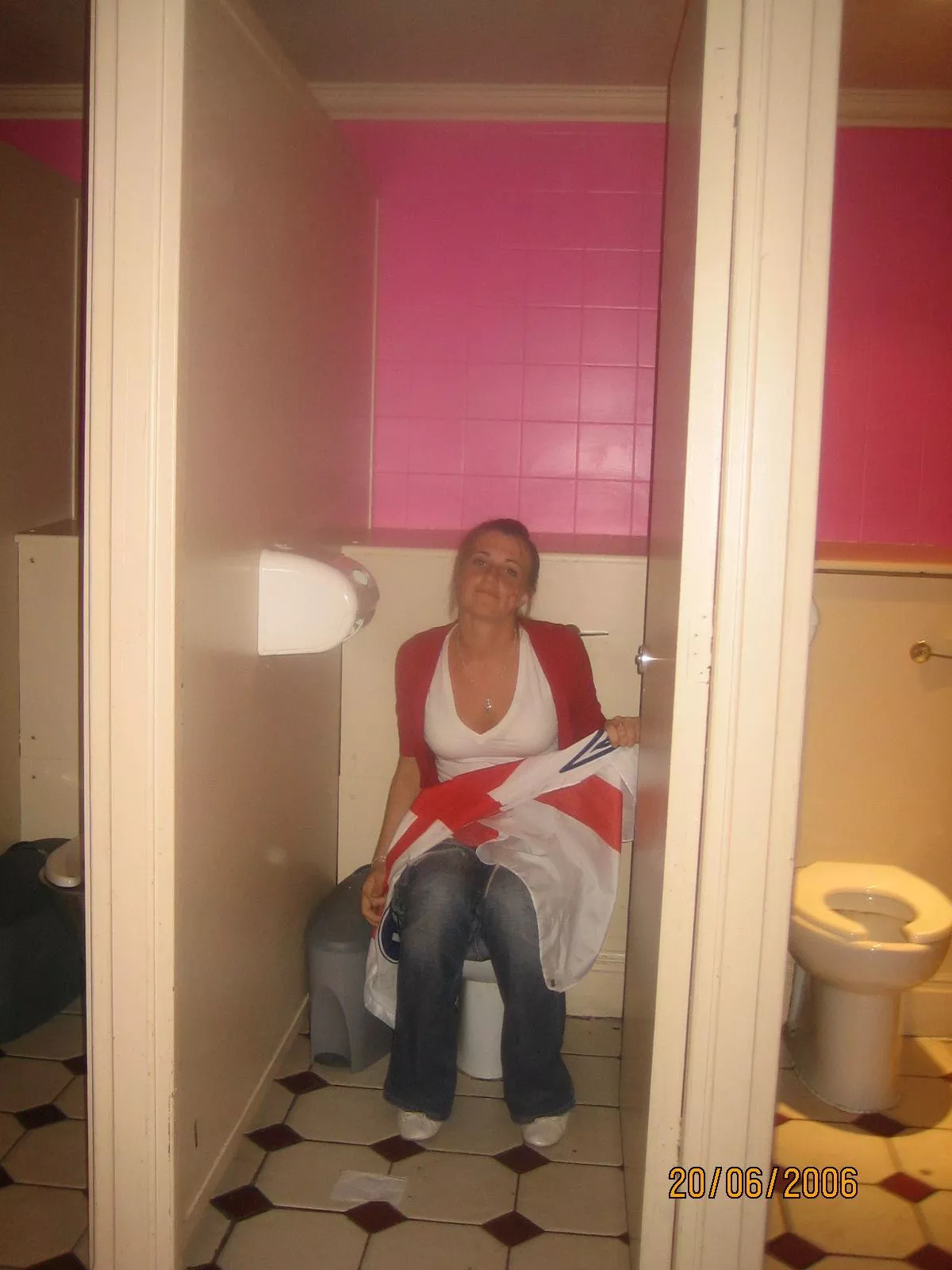 Is she holding a flag? Is she holding a flag?