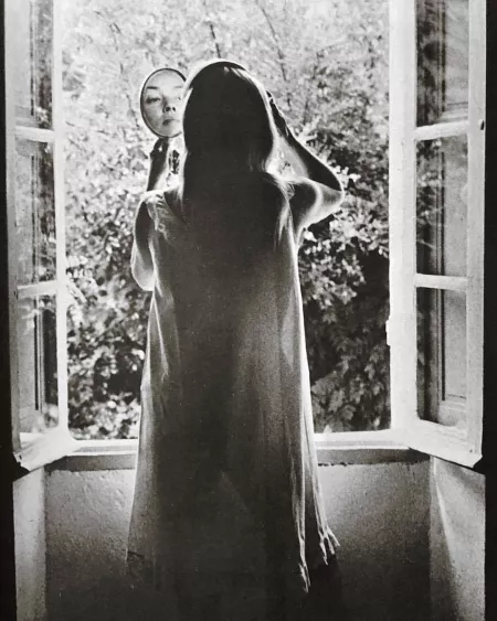 Jeanne Moreau at the window of her Côte d’Azur villa, 1967. Photographed by Cyril Morange, TLPA